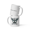Two white mugs stacked, one with text  "REBUILD. REINVENT. REBORN. and the other with theR3:BU1LT industrial phoenix graphics.