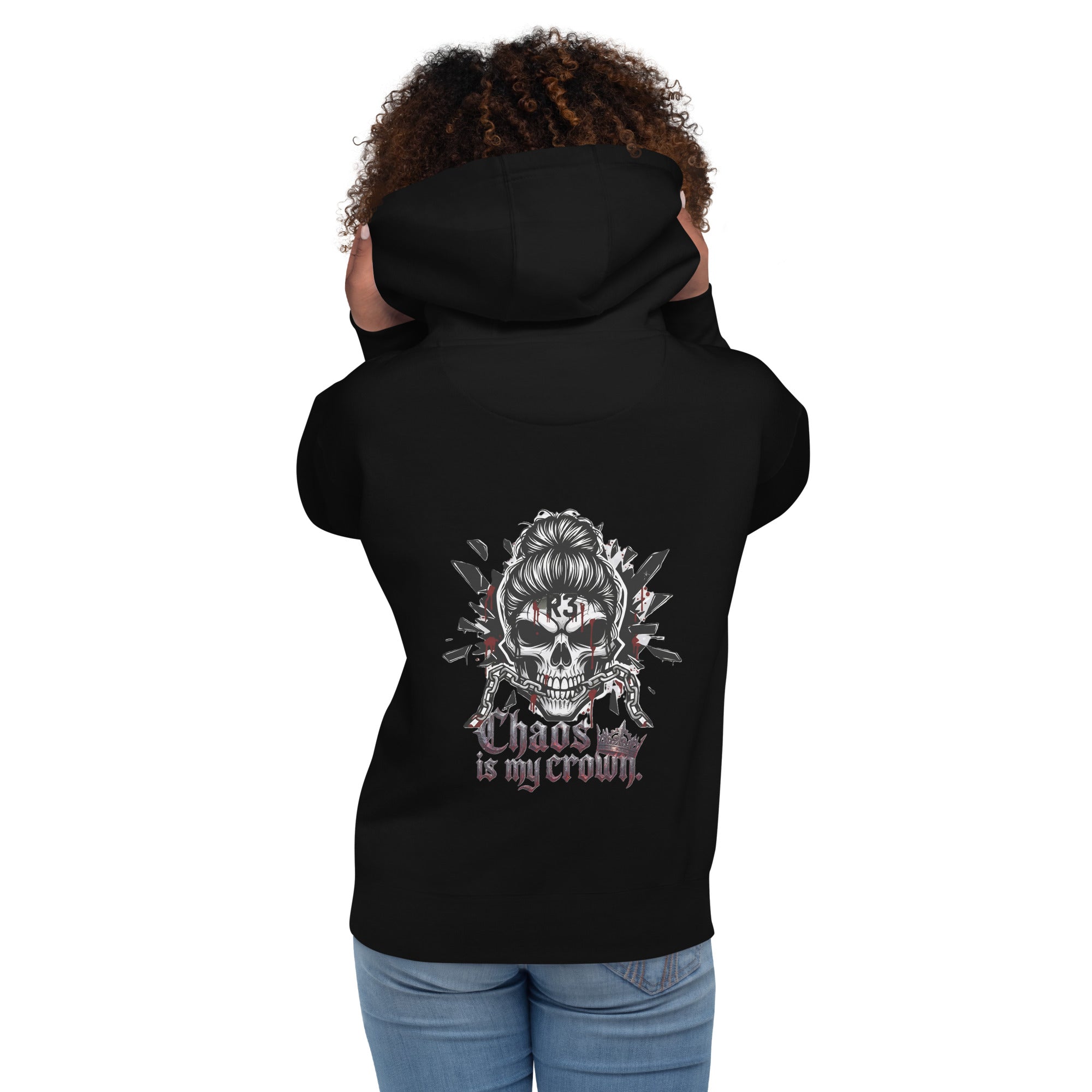 Black hoodie with skull design and Chaos is My Crown text on the back, worn by a woman.