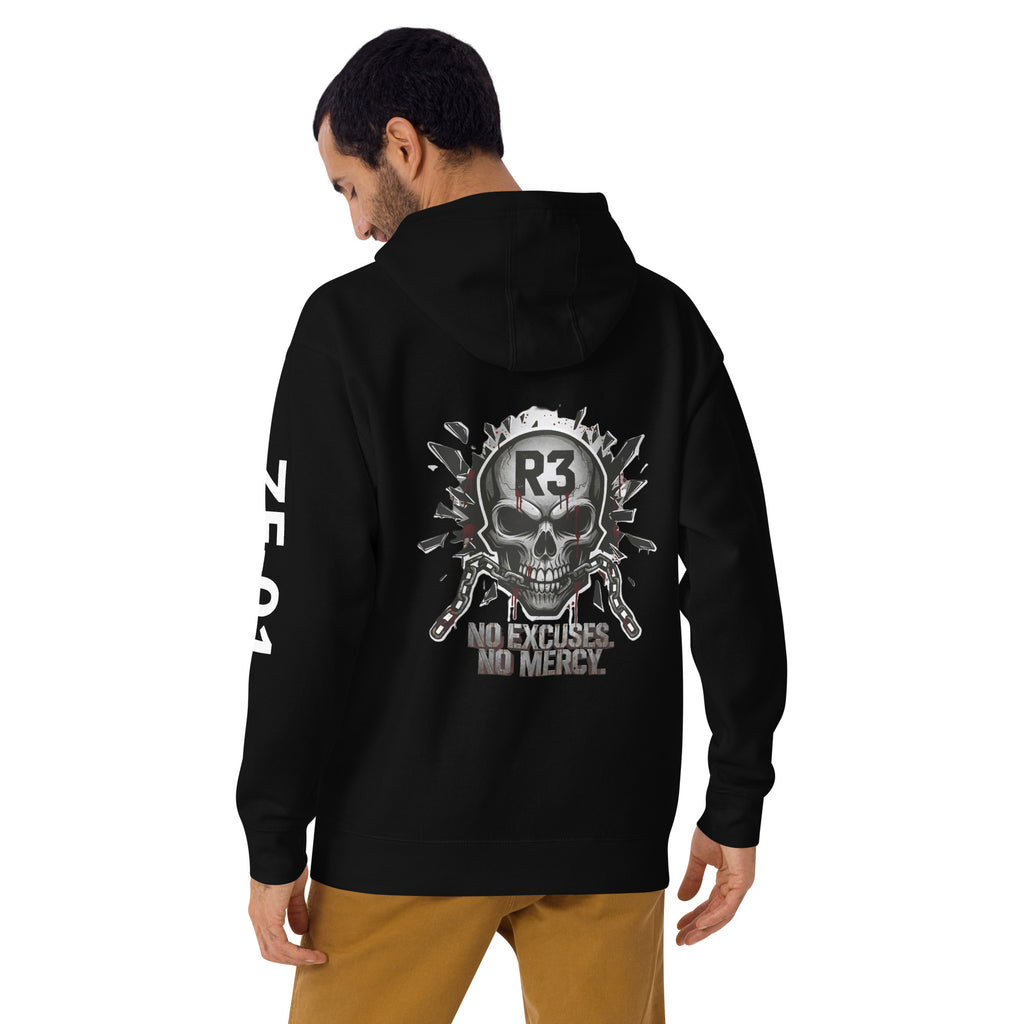 Man wearing a black hoodie with a skull design and No Excuses. No Mercy.