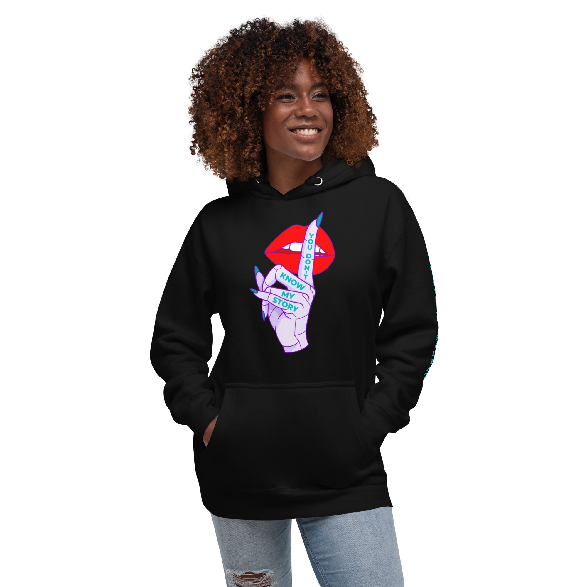Woman wearing a black hoodie with a graphic design of lips and hand art with  text You Don't Know My Story