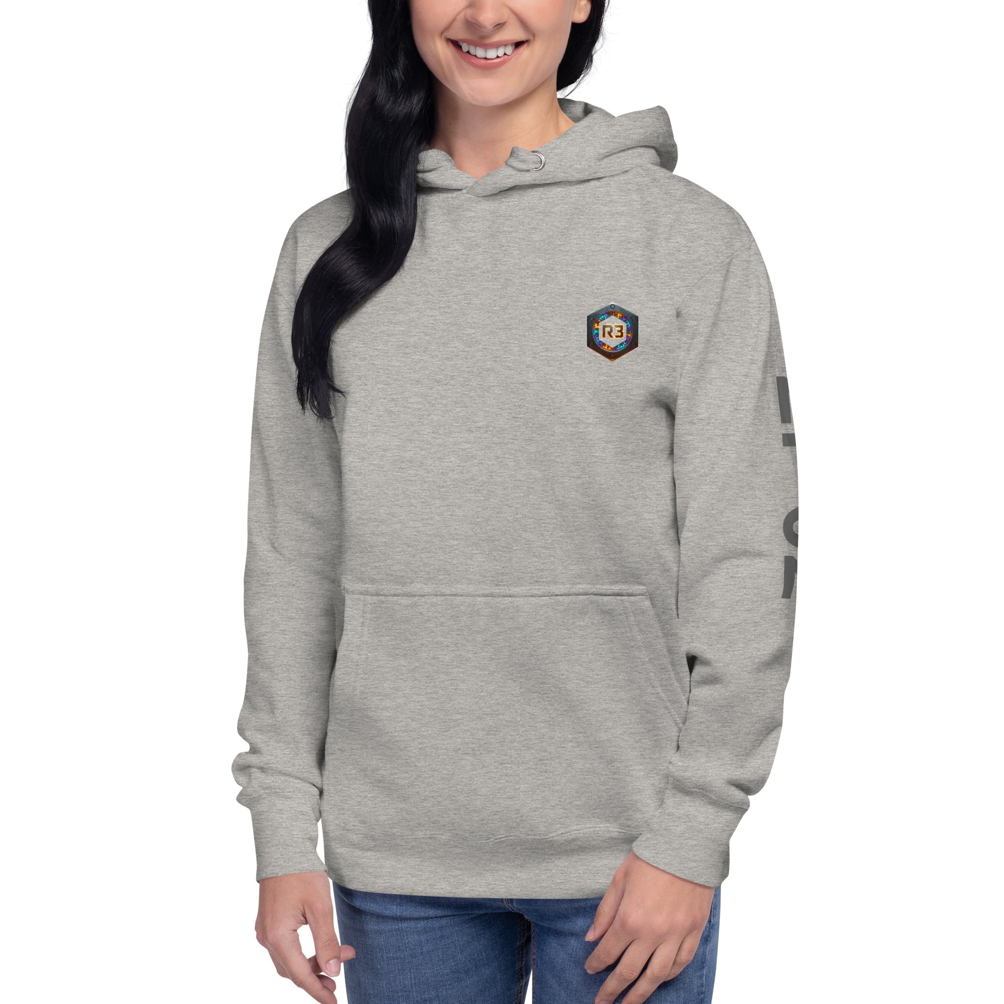 Woman wearing a gray hoodie with a R3 logo 
