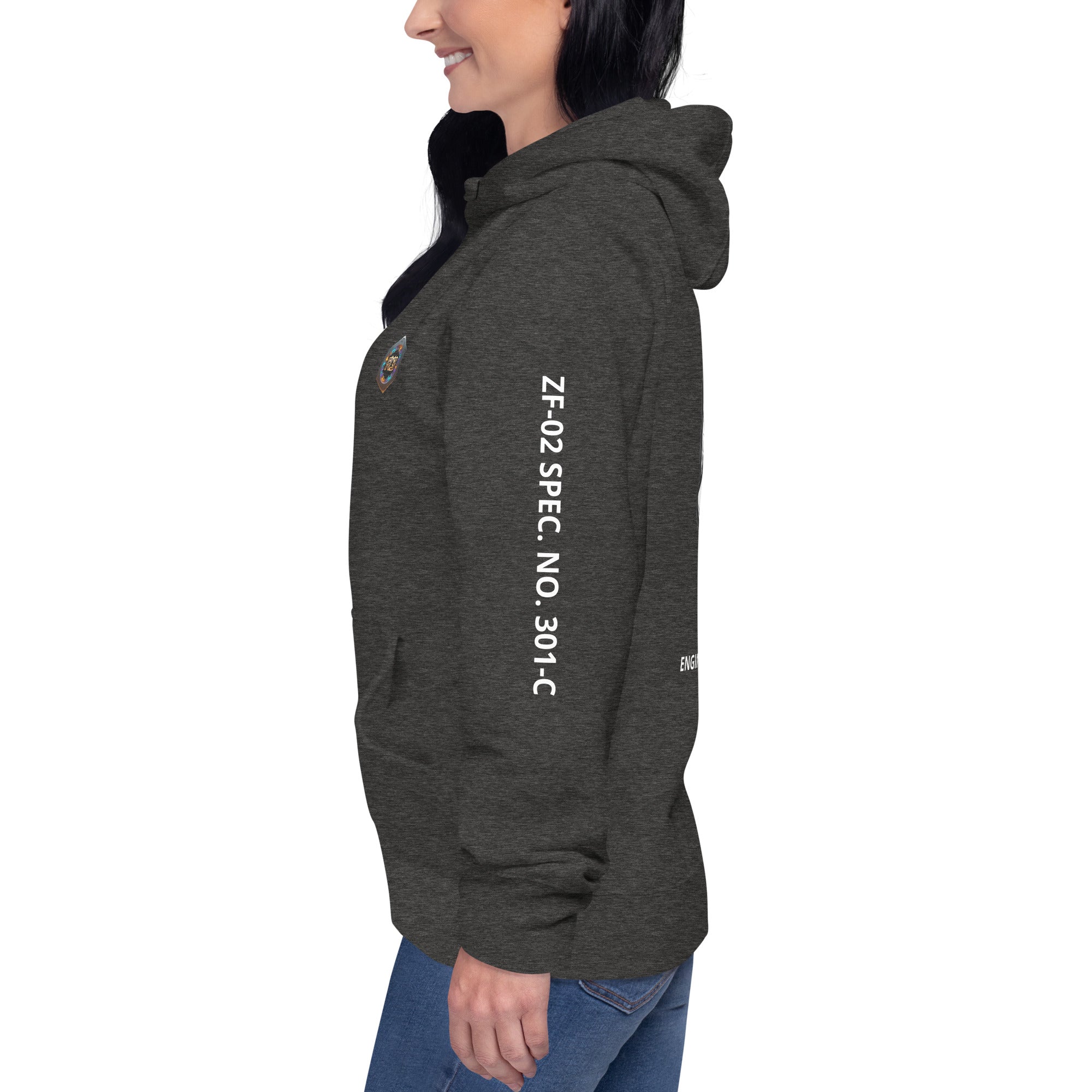 Person wearing a dark heather hoodie with ZF-02 SPEC. NO. 301-C text on the LEFT sleeve 