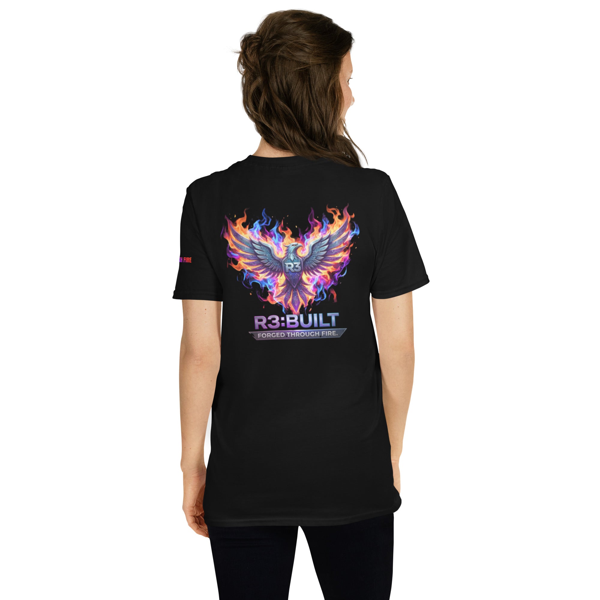 Person wearing a black t-shirt with a colorful phoenix design and 'R3:BU1LT' text on the back.