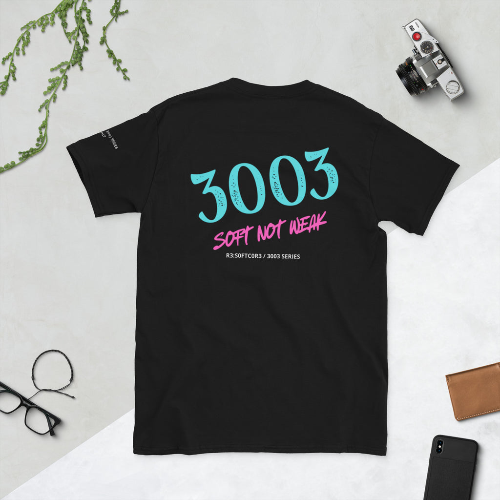 Black t-shirt with with a 3003 Soft Not Weak / R3:S0FTC0R3 / R3:BU1LT logo on a light gray background