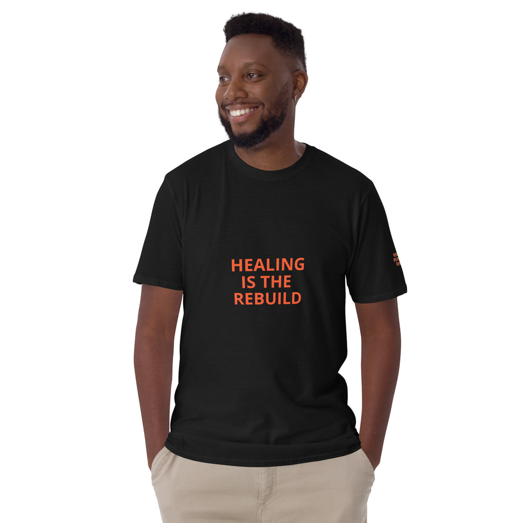 HEALING IS THE REBUILD Black t-shirt front: bold statement text.  REBUILD Series
