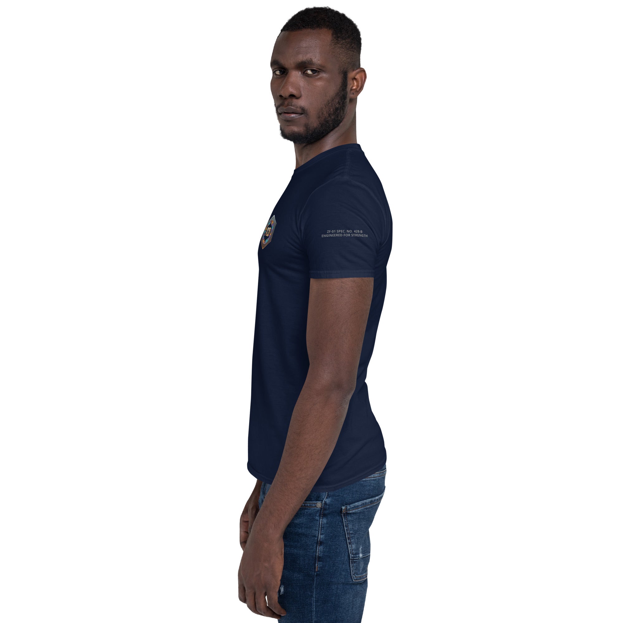 Man wearing a navy blue t-shirt with ZF-01 SPEC. NO. 428-B
ENGINEERED FOR STRENGTH on left sleeve.