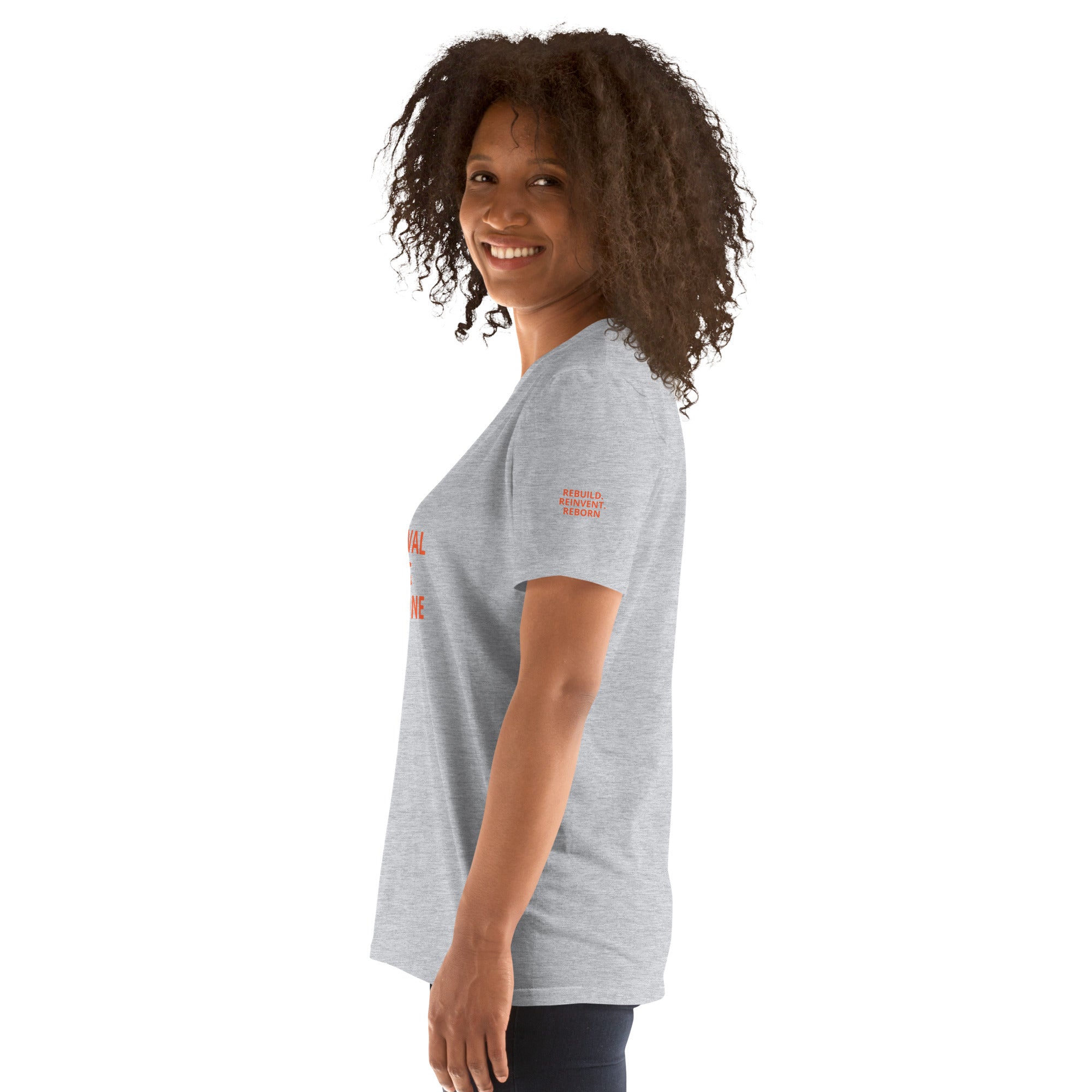 SURVIVAL WAS STEP ONE Sport Grey t-shirt sleeve: REBUILD. REINVENT. REBORN. stacked text.
