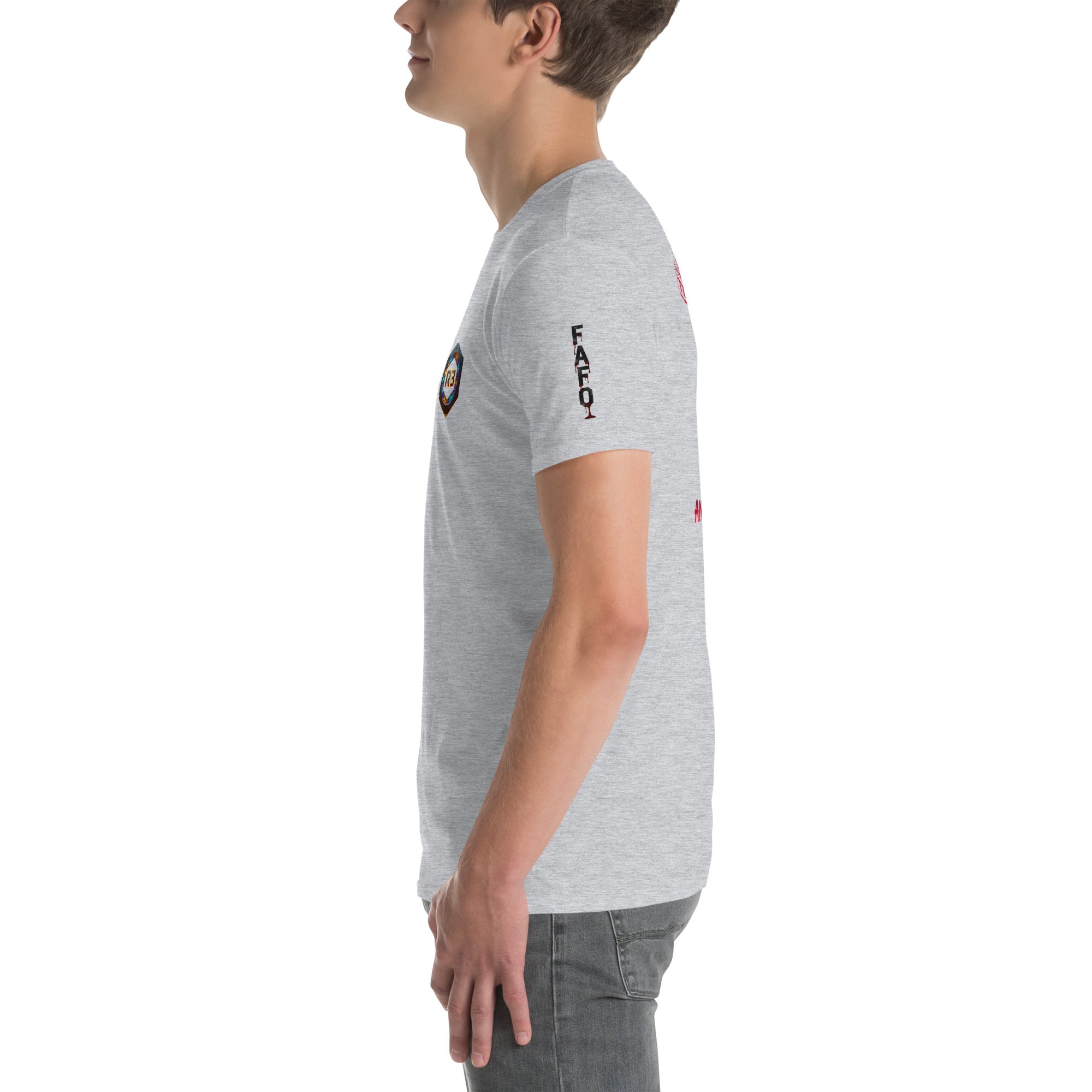 Person wearing a gray t-shirt with graphics FAFO