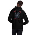 Man wearing a black hoodie with a FAFO Reaper graphic design on the back.