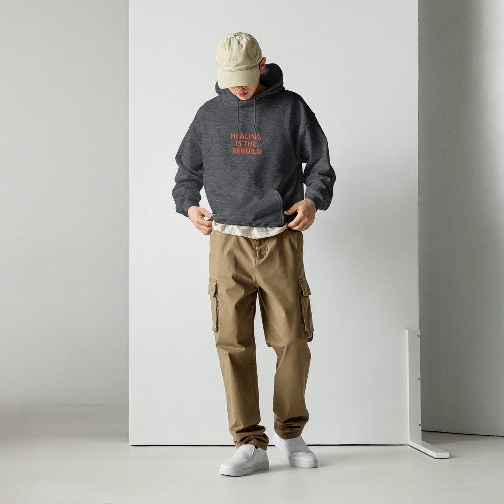 HEALING IS THE REBUILD Dark heather hoodie: industrial text graphic in silver. R3:UNFILTERED collection statement piece.
