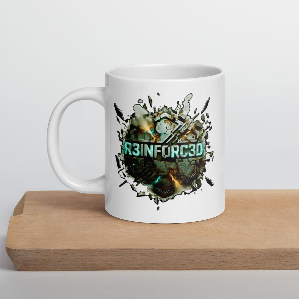 R3INF0RC3D white mug: industrial teal logo on shattered earth & stone graphic. Strength through the cracks.