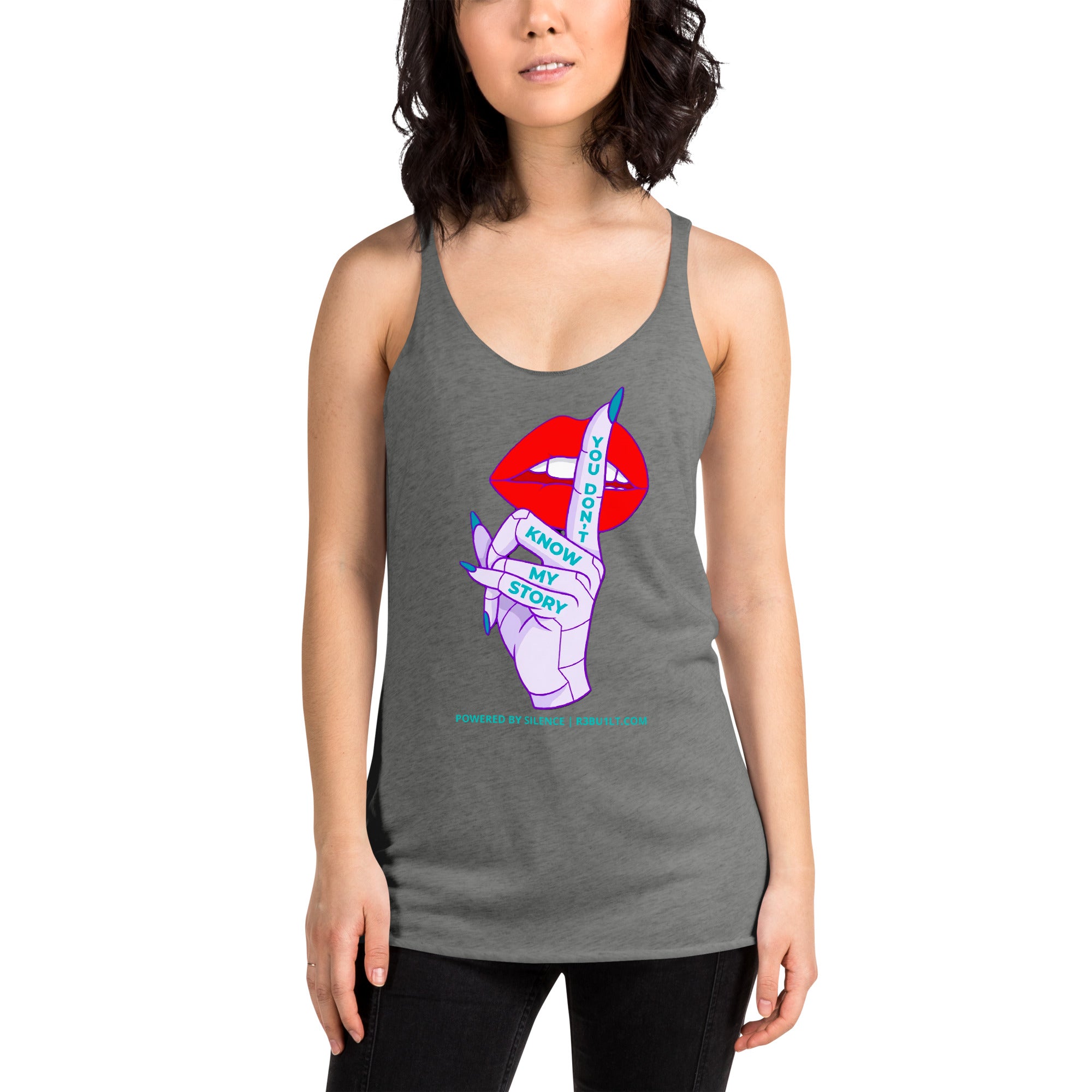 A woman wearing a heather gray racerback tank top. The graphic features red lips, a purple hand, and blue text reading 'KNOW MY STORY'.